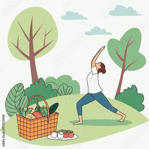 Woman doing yoga and picnic basket in nature
