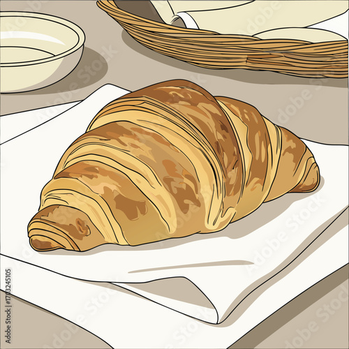 A delicious golden brown croissant resting on a white napkin.