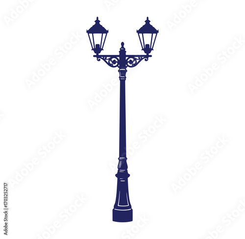 Classic ornamental silhouette of a dual headed vintage street lamp post