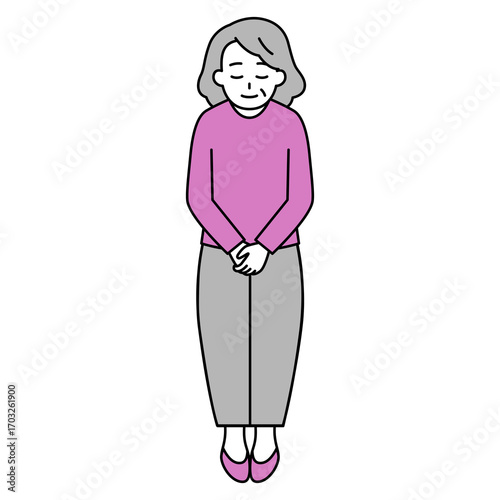 お辞儀をする年配の女性（全身）
