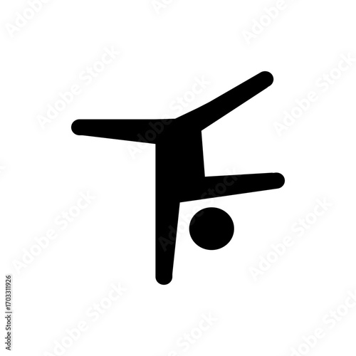Silhouette of a person in a handstand position with one leg up and a ball near the supporting leg pose