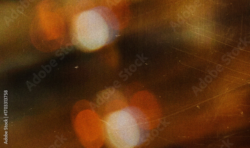 Grainy colorful warm rainbow red light leaks on black background with dust texture. abstract damaged scratched retro film analog effect for using over photos as overlay or screen filter