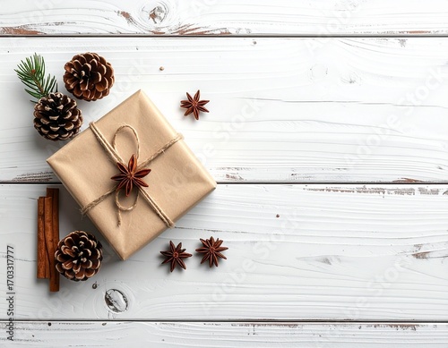 Christmas background with a gift box and decorations, top view.