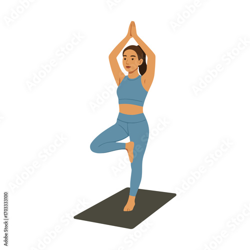 Woman Practicing Tree Pose on Yoga Mat