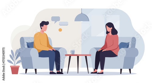 Two people engaged in a counseling session, sitting in armchairs, communicating.