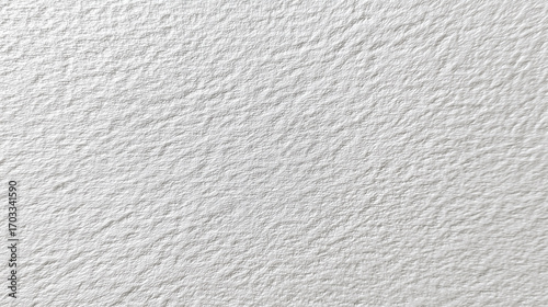 Rough white textured wall surface with visible grain ideal for realistic backgrounds construction materials and interior design presentations