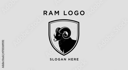 Monochrome graphic design featuring a black ram's head with curved horns inside a shield emblem.