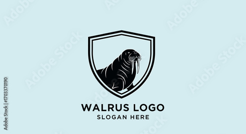 A black and white walrus illustration inside a shield, presented as a logo design on a light blue background.