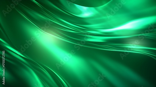 Green abstract silk background with smooth flowing texture and soft wave design
