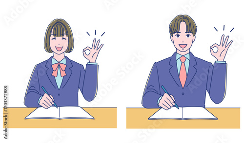 勉強しながらオッケーサインする男女の生徒