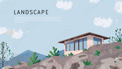 Modern house on rocky hillside with mountains and sky