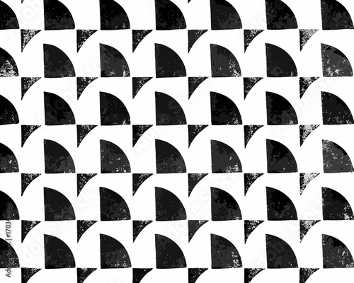 Abstract geometric pattern with black quarter circles and triangles