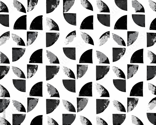 Abstract geometric pattern with textured quarter circles in black and white
