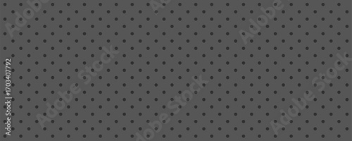 Gray Pegboard peg board gray wall with dots, holes in geometric grid pattern. Perforated panel for hooks, diy construction. 