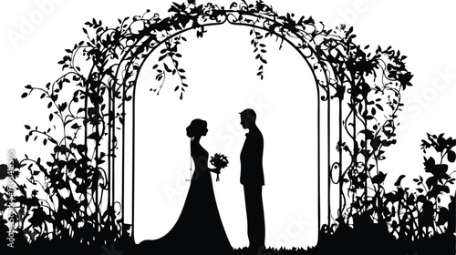 Silhouette of a bride and groom standing under a floral archway on their wedding day
