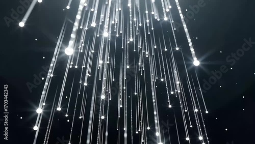 Elegant shimmering particle rain, an abstract animated background for your digital projects, creating a dazzling and dynamic visual effect of falling light