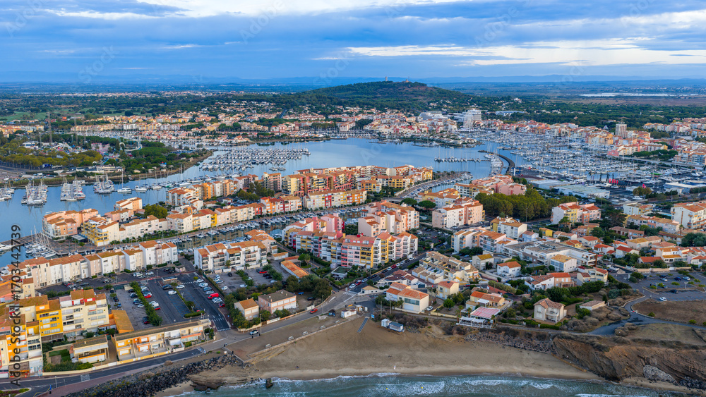 Fototapeta premium Panorama of the beach at sunrise in Cap d'Agde in Occitanie, France