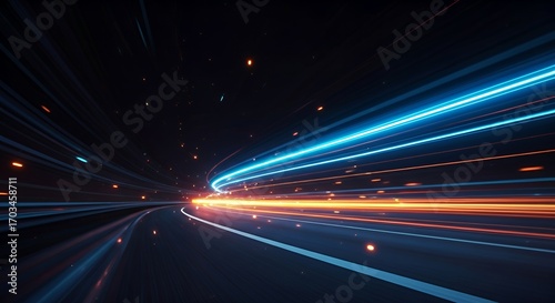 Dynamic neon light trails in blue and orange creating a sense of speed and motion on a dark road. Futuristic abstract background design concept for technology, energy, and fast movement.
