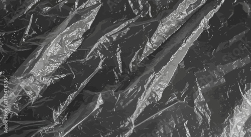 Detailed abstract texture of crumpled plastic sheeting with glossy highlights