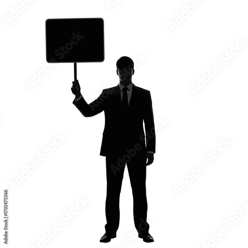 Silhouette of a businessman holding a blank sign