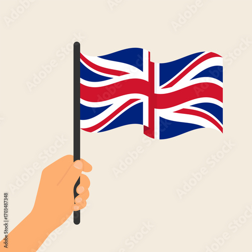 Hand raising British flag. Vector illustration, EPS10