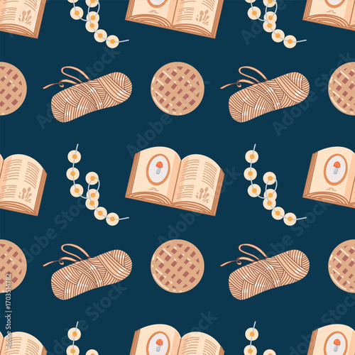 Warm cozy atmosphere of autumn seamless pattern. Garland, yarn, books, waffles on dark blue background. Colorful background with autumn elements and attributes. Cute print with autumn mood for