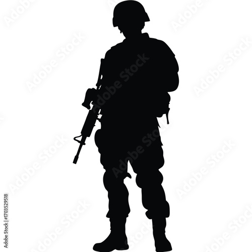 Soldier stands in silhouette, holding assault rifle and wearing military gear in strong light