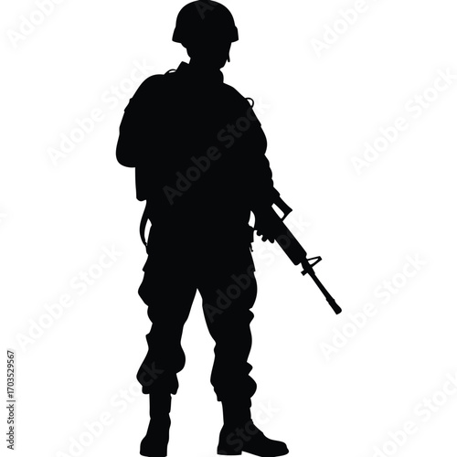Soldier silhouette stands with rifle at ready in full gear wearing combat helmet