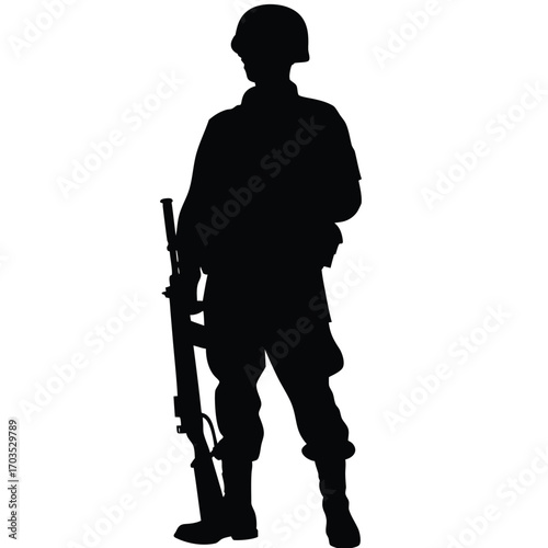 Isolated soldier silhouette in helmet stands tall holding rifle, expressing determination and focus