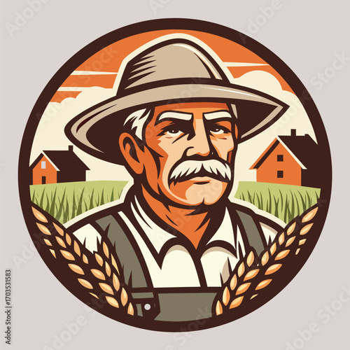 Elderly Caucasian farmer stands proudly before his wheat fields wearing overalls and a hat