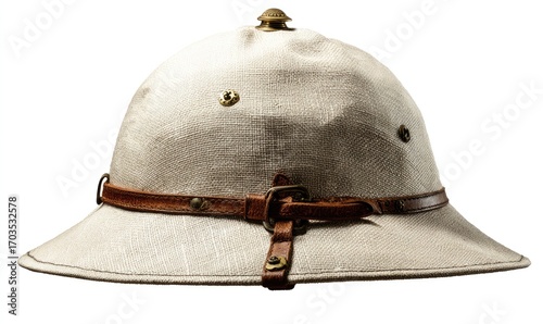 Off-white canvas pith helmet with brown leather chin strap and brass accents;  wide brim, slightly worn appearance