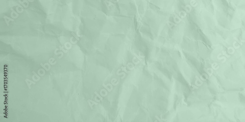Creative background with scattered overlay of crumpled papers.