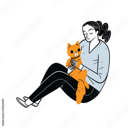 Young woman sitting on the floor and lovingly cuddling her cute ginger cat, showing a strong bond and affection.