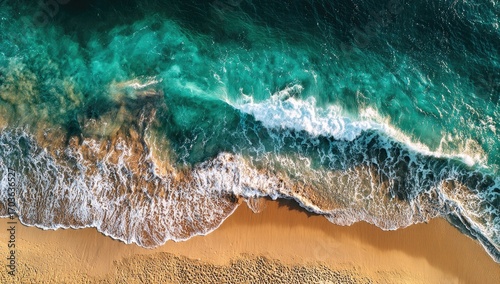 Aerial view ocean waves crashing sandy beach, sunset (1)