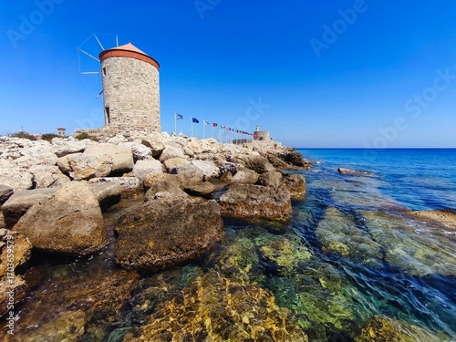 Rhodes windmills. Beautiful concept for travel and vacation in Greece.