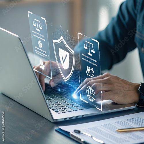 Person using a laptop with futuristic holographic interface displaying legal and security icons and global network symbols