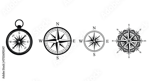Set of four vintage compass rose designs for nautical navigation and exploration themes vector
