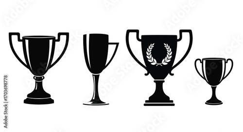 Collection of four award trophies silhouette graphic representing success achievement victory and sportsmanship vector