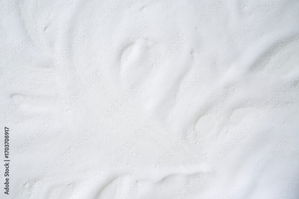 Obraz premium Colse up of various white cream foam on the table background