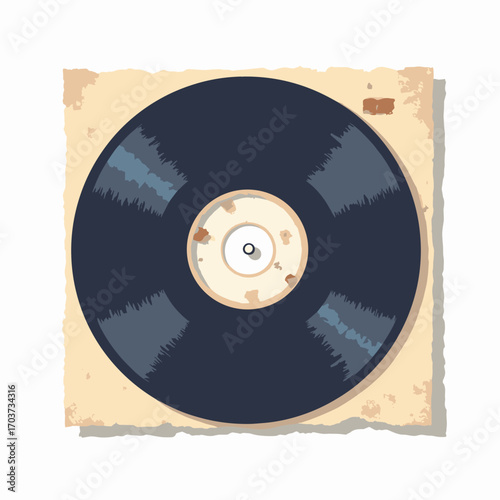 45 RPM adapter and sleeve — small metal spindle insert with paper sleeve edge, white background
