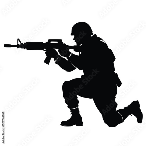 Silhouette of Soldier Kneeling and Aiming a Rifle in Combat Ready Stance