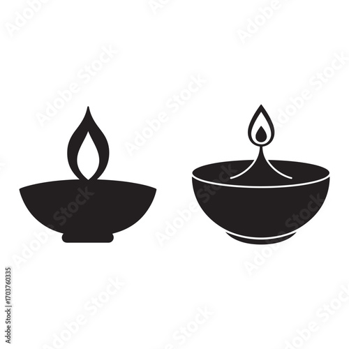 This image displays two black silhouettes of oil lamps. The lamp on the left is a simple, shallow bowl with a prominent flame. The lamp on the right features a slightly deeper bowl with a central wick