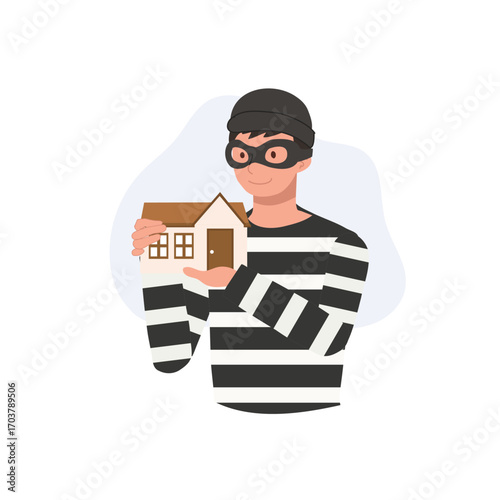 burglar with mask holding house representing criminal activity robbery and home safety concerns