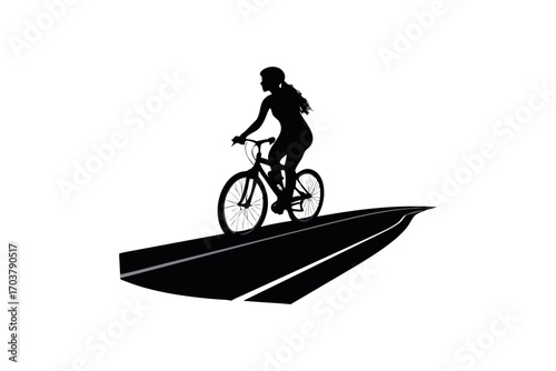 a cyclist rides along railway tracks silhouette