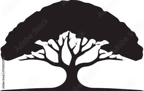Silhouette of a large lush tree with spreading branches and a round canopy symbolizes growth and nature