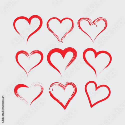 Set of red heart shapes in brush stroke style. Romantic hand-drawn design perfect for Valentine’s Day, love cards, wedding invitations, and romantic decorations
