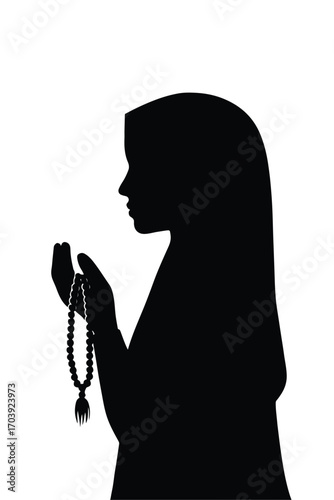 Silhouette of Muslim Woman in Prayer with Headscarf
