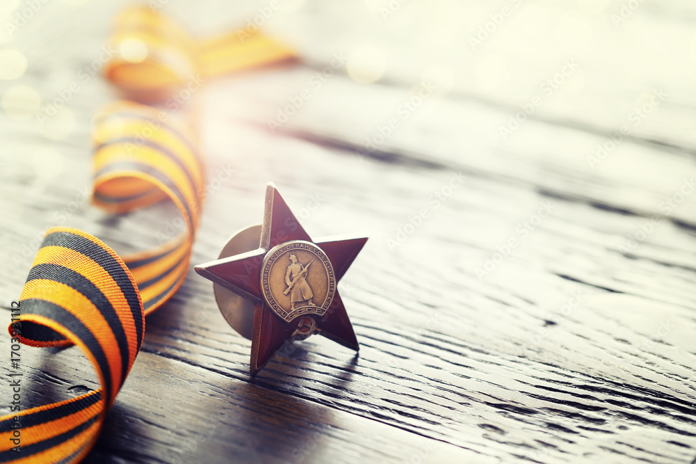 Naklejka premium The Soviet order of the Second World war, Victory Day 9 May postcard concept, toned vintage