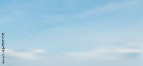 A serene sky of delicate blues blending smoothly with subtle white clouds creates a soft, calming atmosphere conveying vastness and gentle airiness in a blurred, peaceful scene