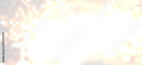 Blurred abstract light effects create a serene, luminous background, showcasing golden hues and soft gradients that blend seamlessly to evoke a sense of tranquility and warmth